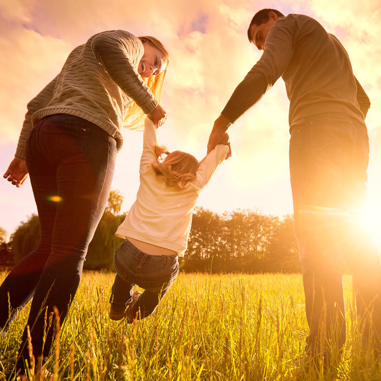 Photo of family in a field