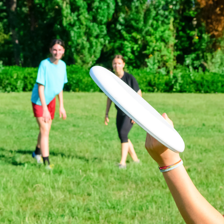 People playing ultimate frisbee.