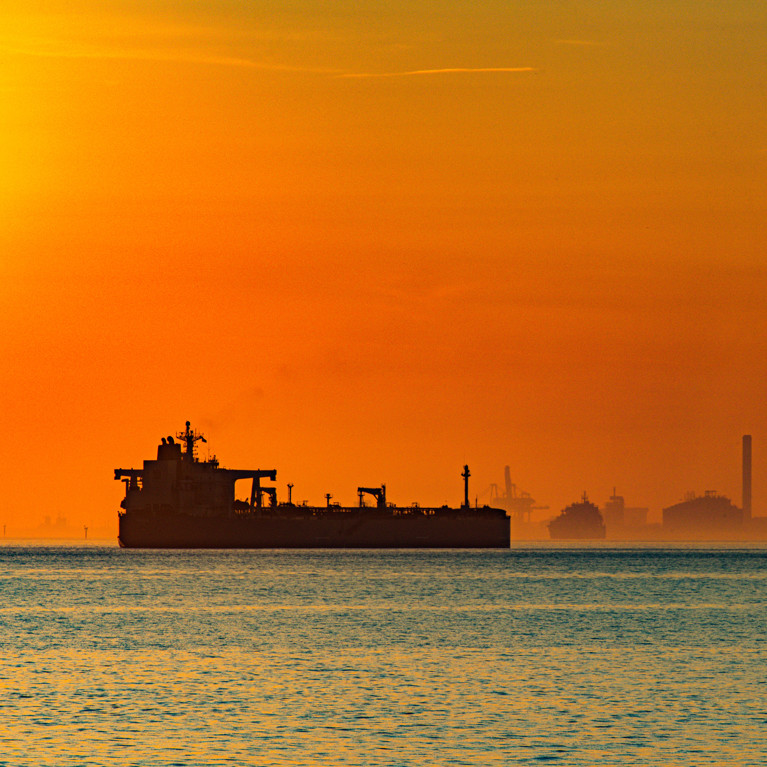 Large oil tanker sailing in fos-sur-mer harbor at sunset. Picture: Georges/Adobe Stock