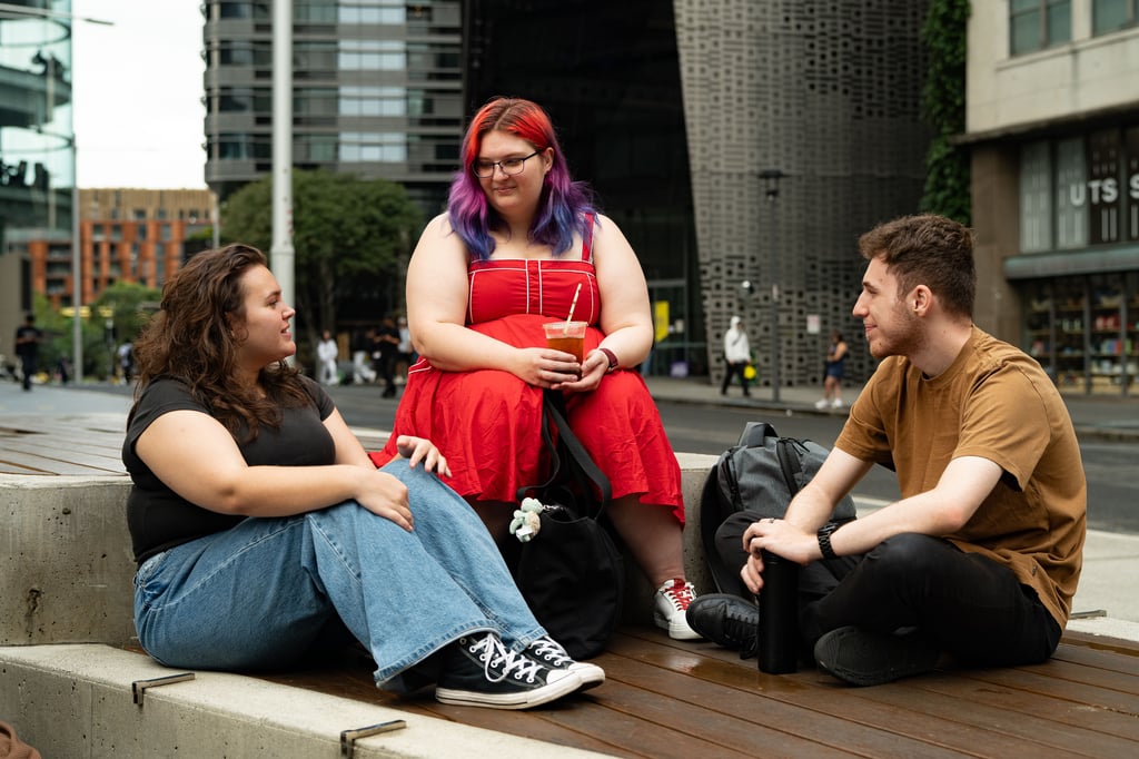 three people gathered at UTS