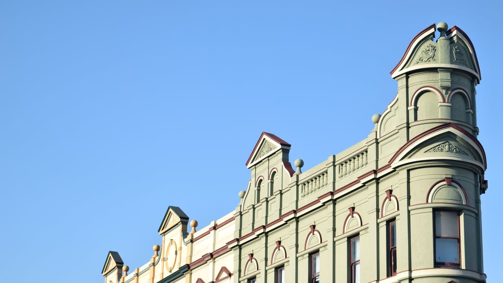 Facade in Newtown, painted in pastel green.