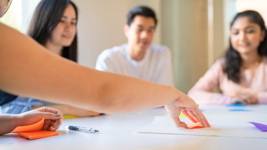 University of Technology Sydney students working together at a desk
