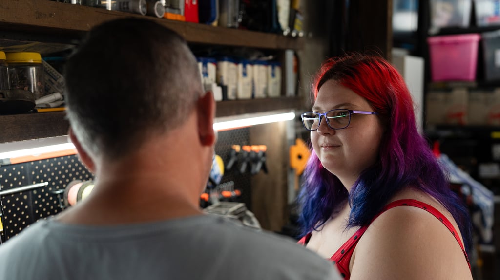 Chloe and her dad in the workshop