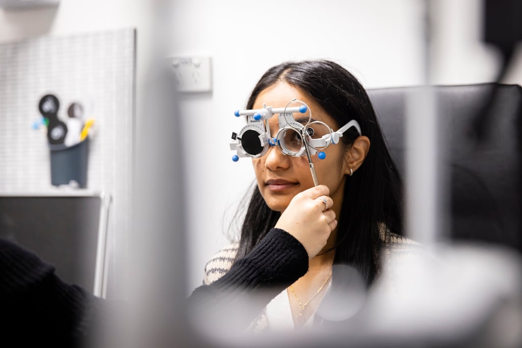 Orthoptics students conducting an eye exam.