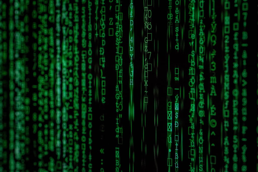 Black screen with floating green text.