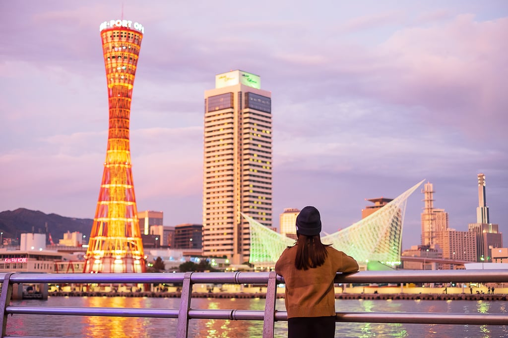 Young woman traveling at Kobe port near Osaka