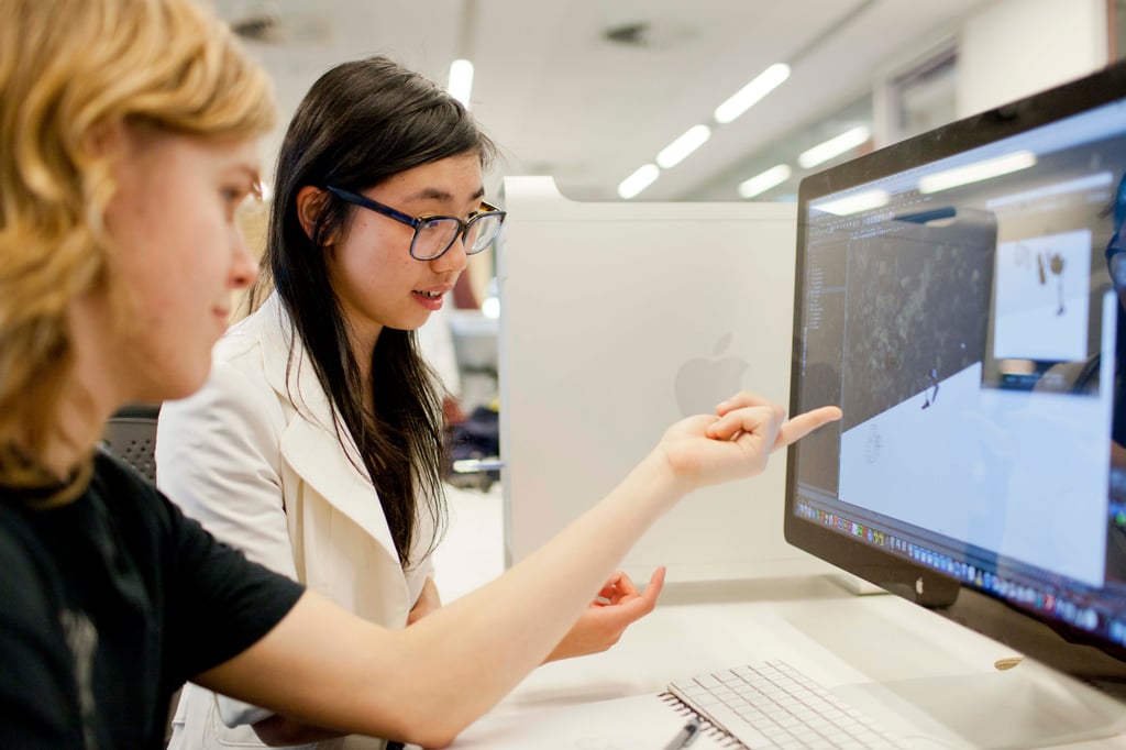 Undergraduate students collaborate on a project in the Building 3 sound studios.