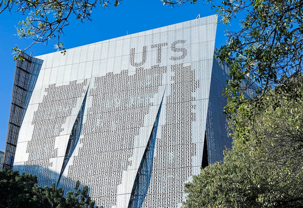 Building 11, Faculty of Engineering and IT and sky.