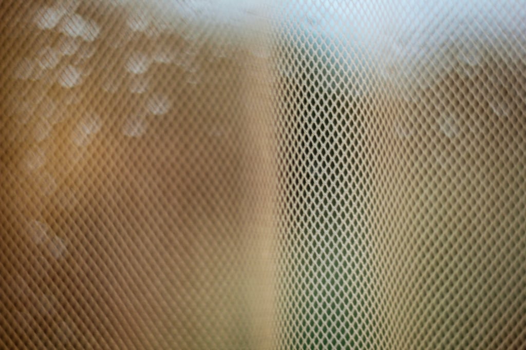 Abstract close up of gold metal lattice
