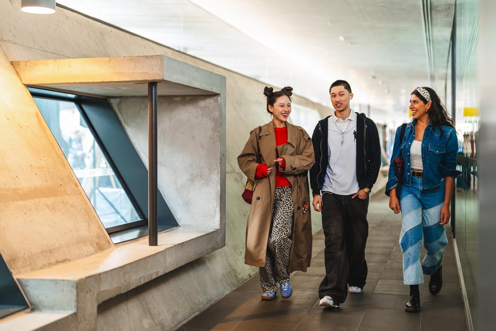 Three prospective students navigating around campus during UTS Open Day.