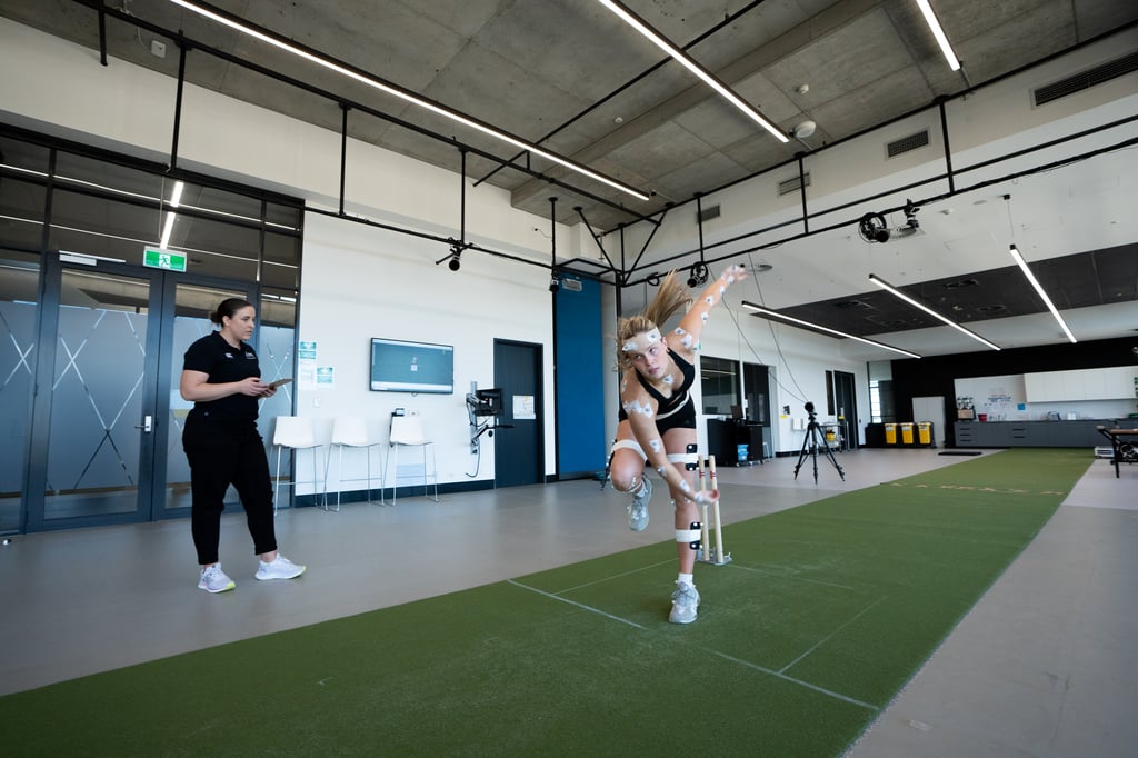 Dr Libby Pickering Rodriguez (left) uses input from sensors attached to the athlete and captured by cameras to create 3D models of an athlete’s movements. (Image: Grainger Films