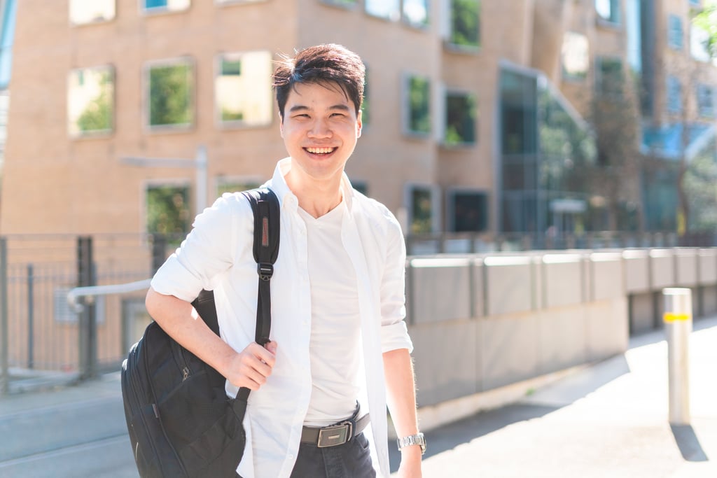 Under 18 UTS international student smiling
