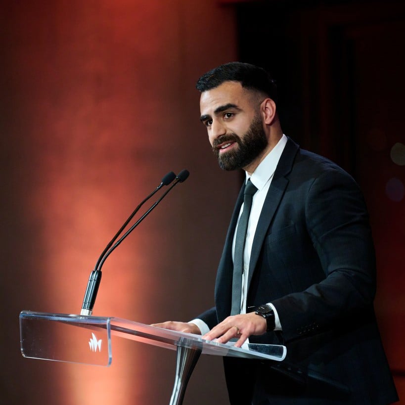 Awkar Ruel speaks at an event