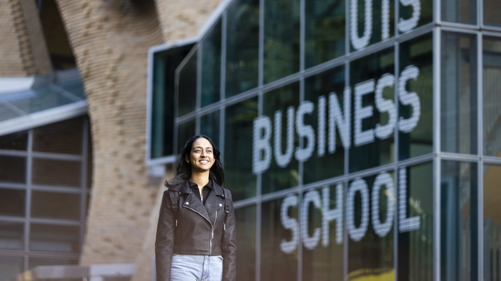 Female student in front of University of Technology Sydney Business School