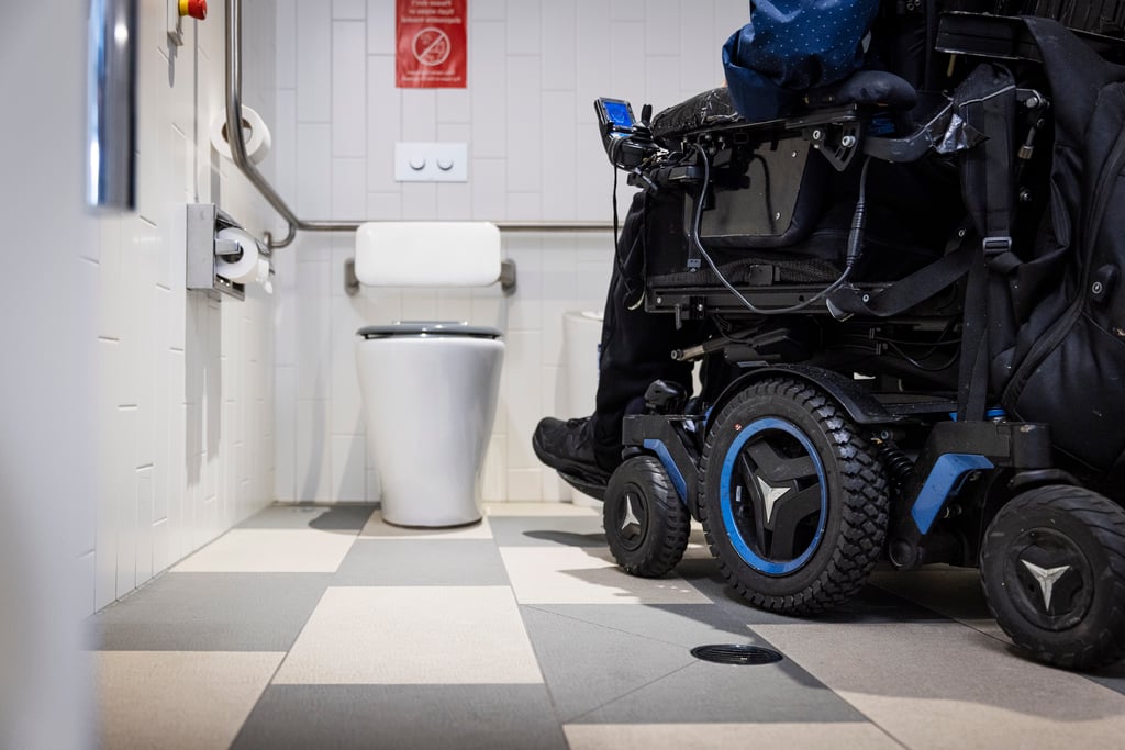 Accessible bathroom with wheelchair user