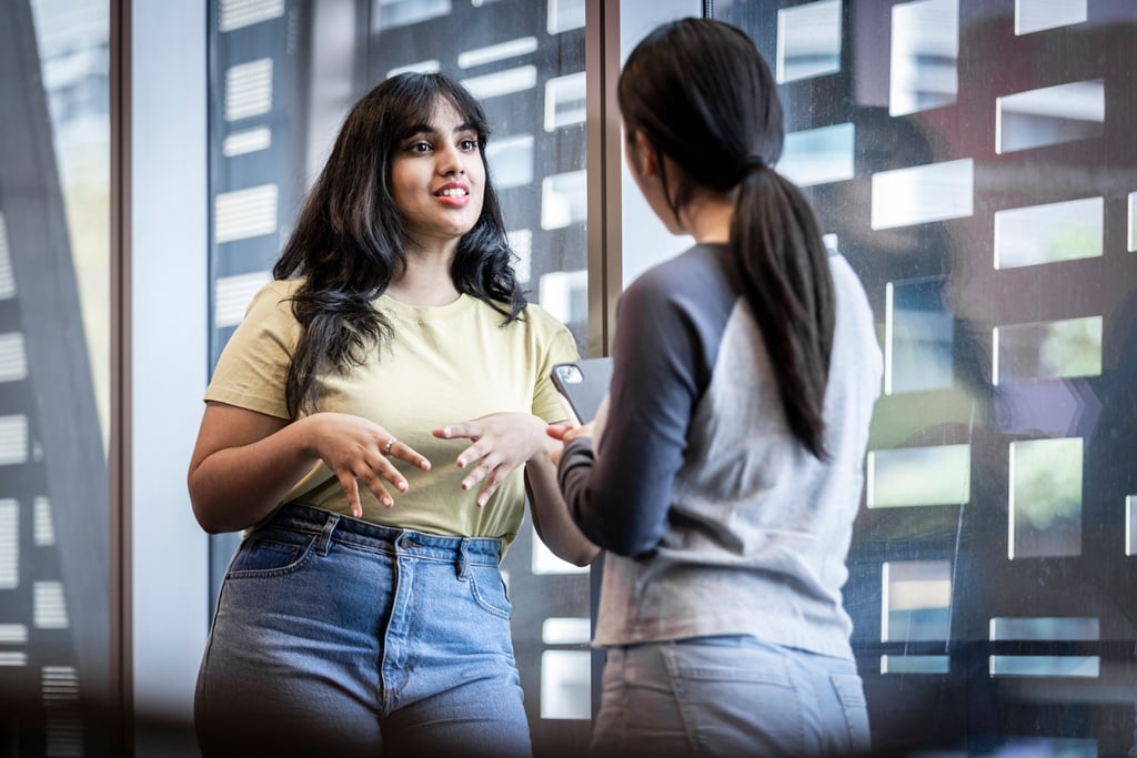 Two students discussing.