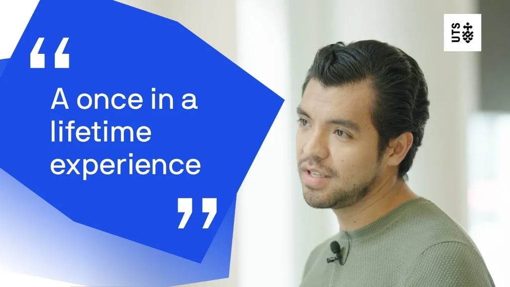 The words "A once in a lifetime experience" appear in a blue and white super graphic against a portrait of Rodrigo from the chest up. He is dressed in a green t-shirt with black hair. He is speaking to someone off-camera.