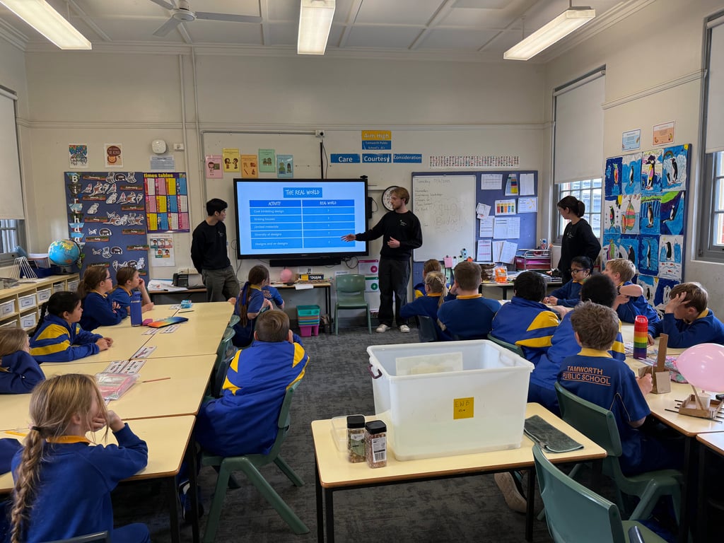 UTS Bachelor of Engineering Civil Construction student giving a workshop to high school students.