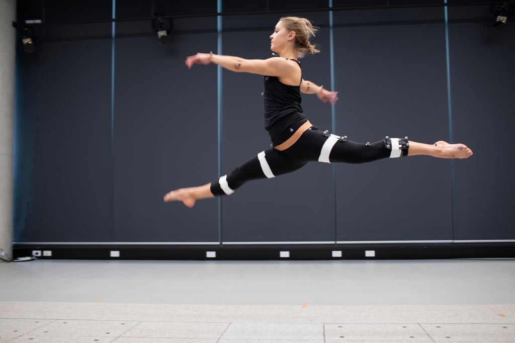 A female leaping in the Human Performance Research Centre.