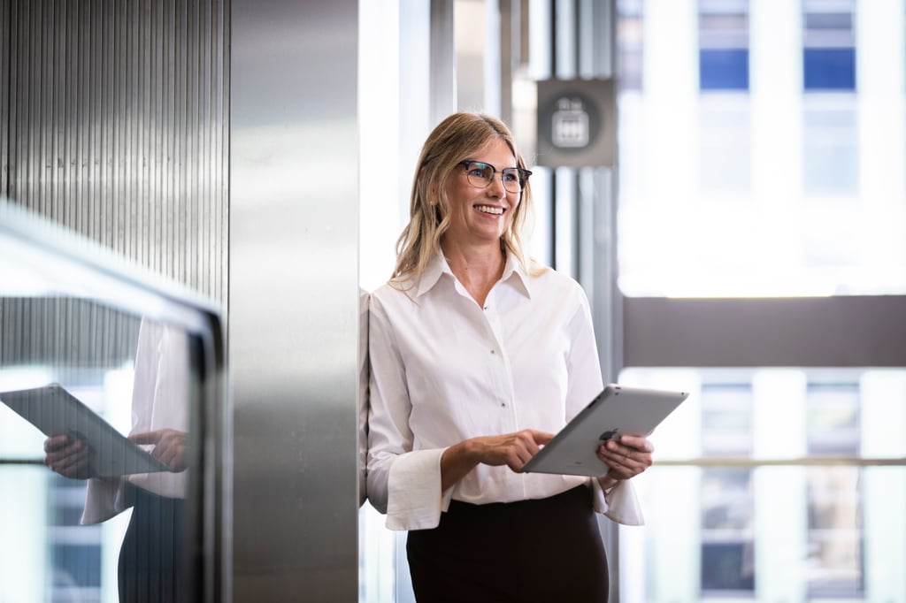 Female student using iPad
