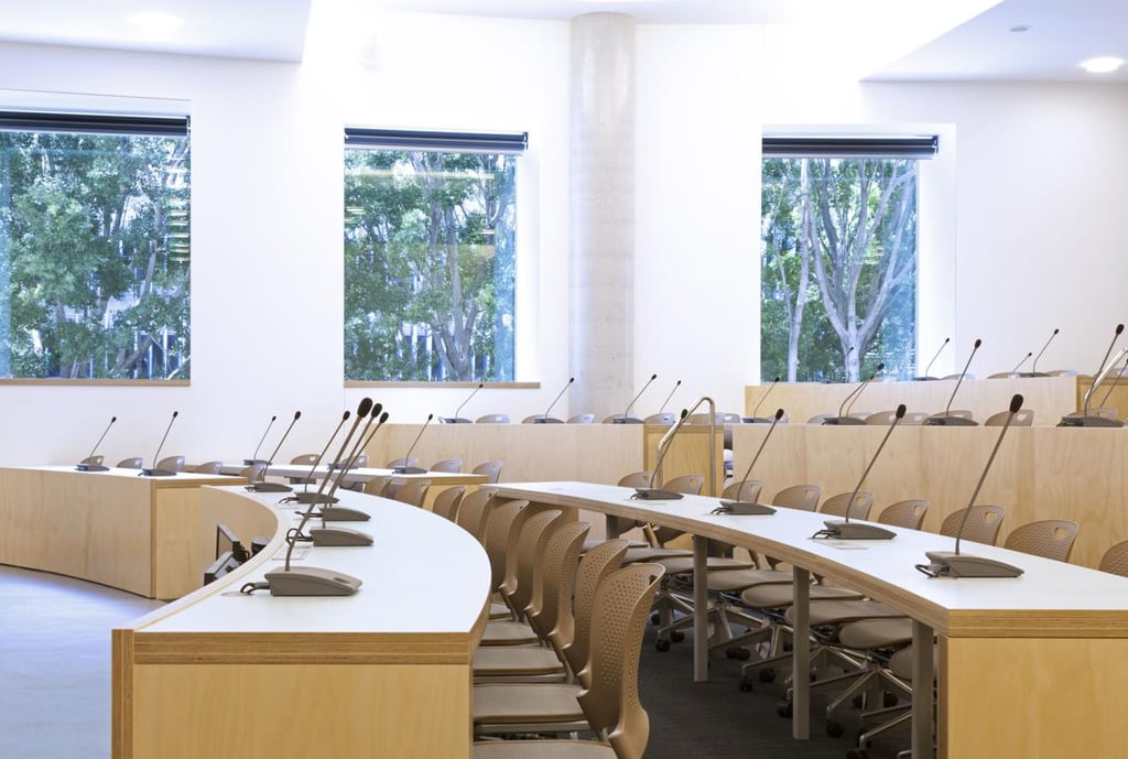 Seats and desks in a university lecture theatre.