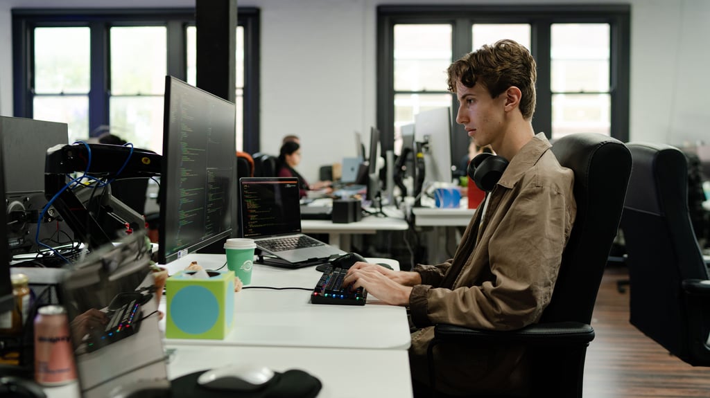 Finn Randell working on code at Updoc