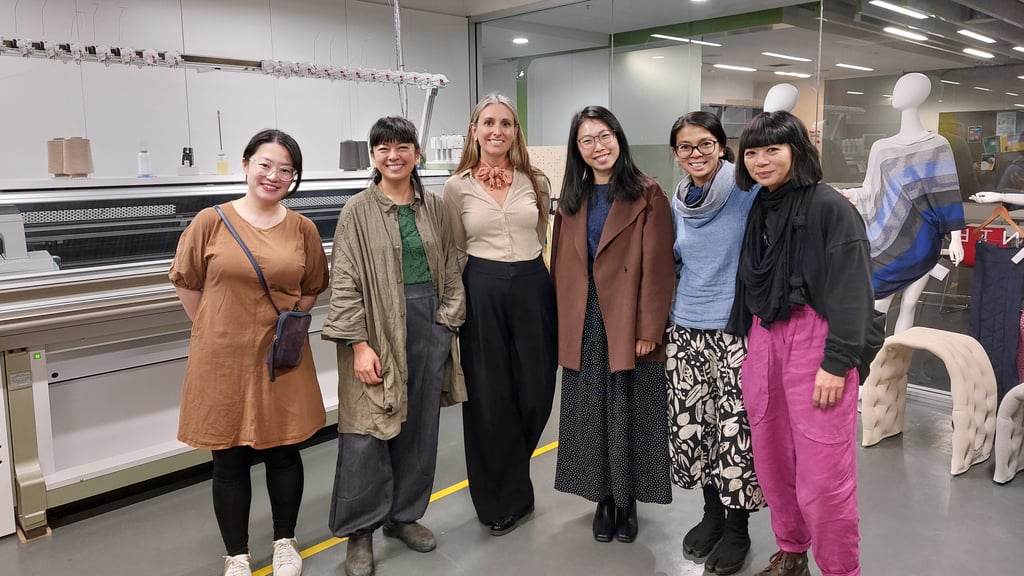 A group portrait of six members of the project team