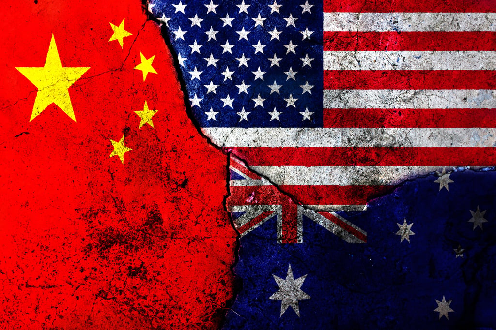 Cracks in the wall. Graphic incorporating the flags of the USA, China and Australia. Picture by cil86/Adobe Stock