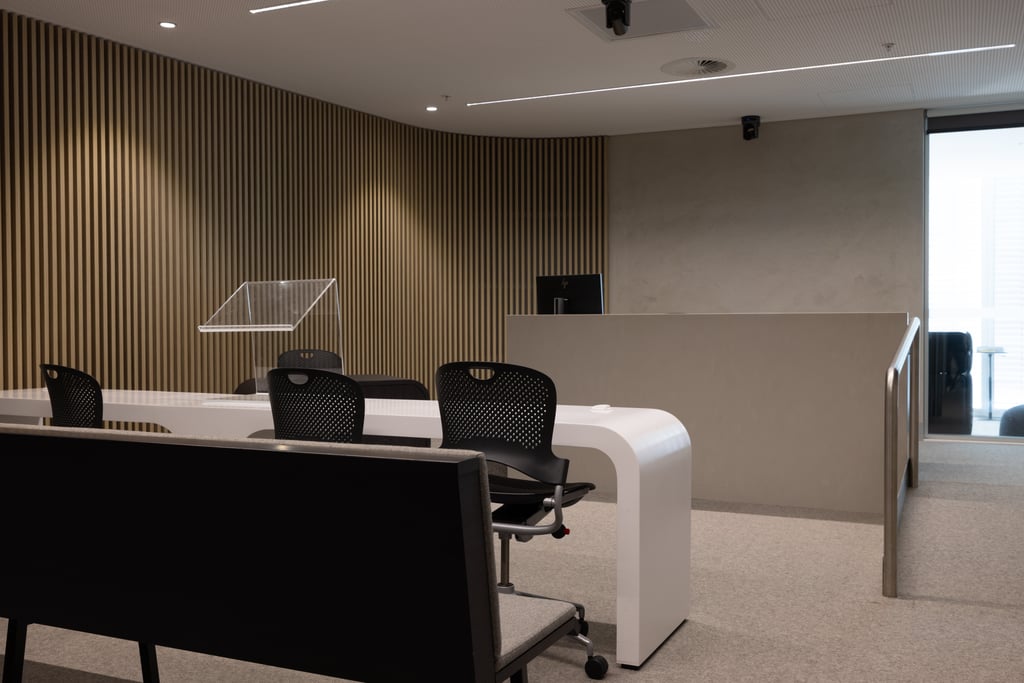 The UTS trial court, used by students to develop their courtroom skills. A judge's desk, a lectern and two chairs can be seen.