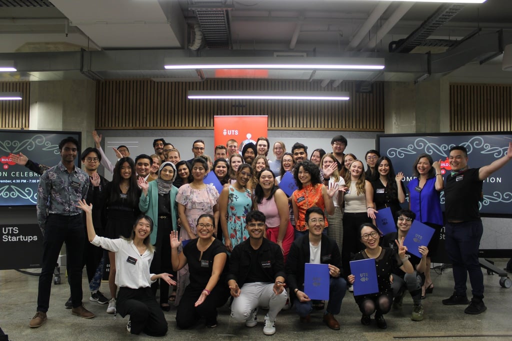 Shiva Sharma standing in a large groups of fellow UTS Build students