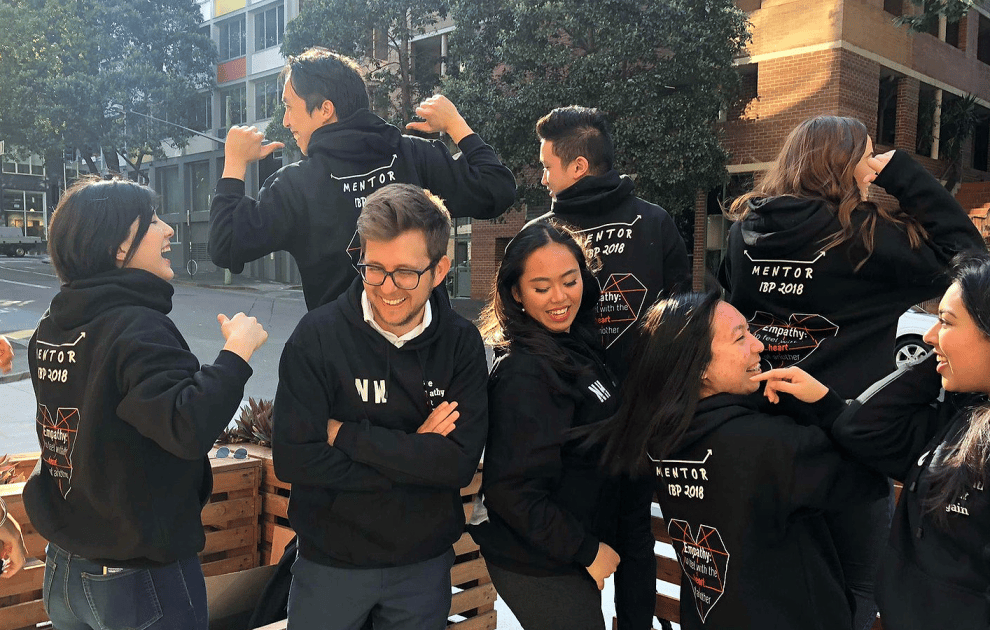 The mentors wearing their new hoodies