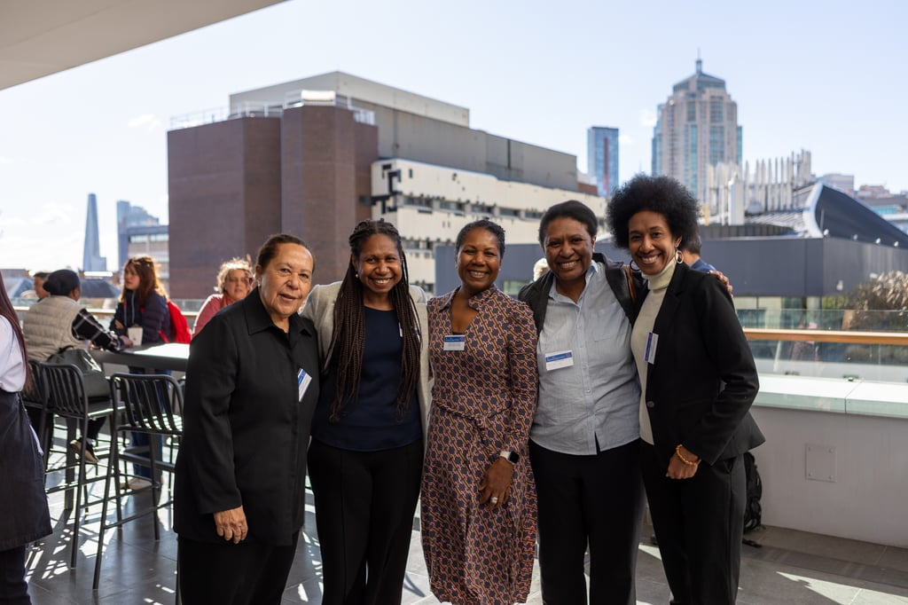 A group of ladies standing