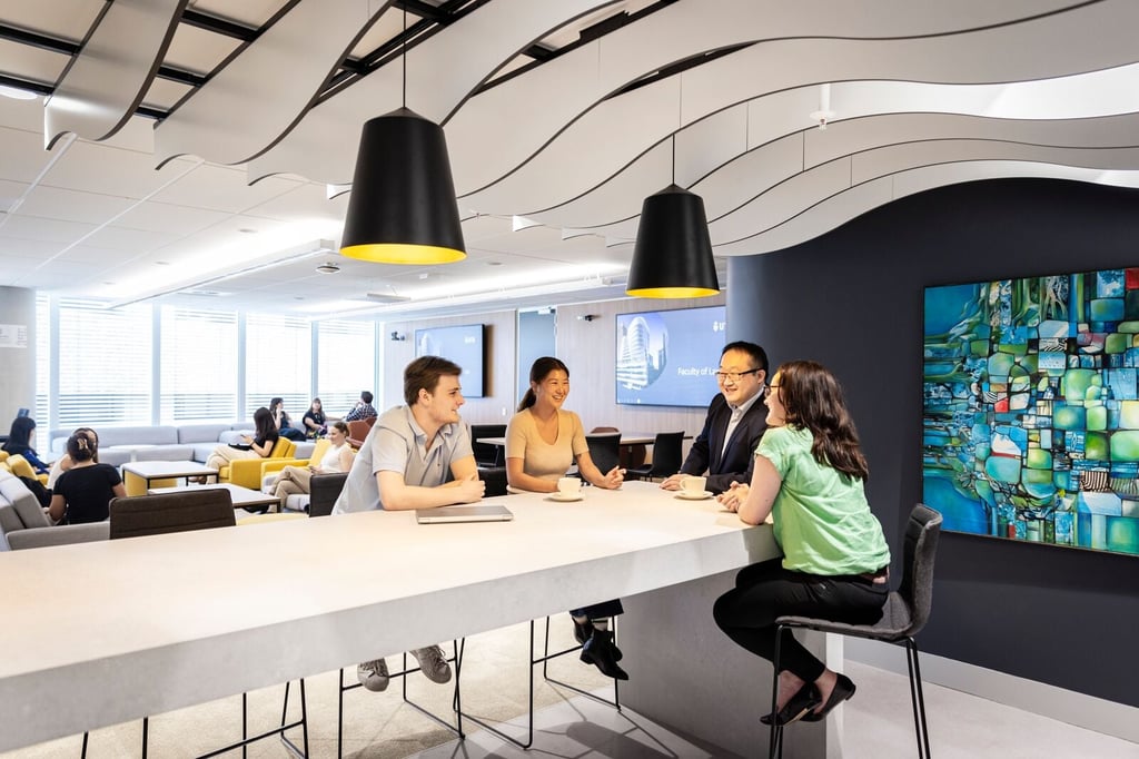 Students studying in the postgraduate Law Lounge on level 14