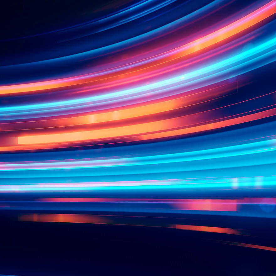 Black background with orange, blue and purple light waves