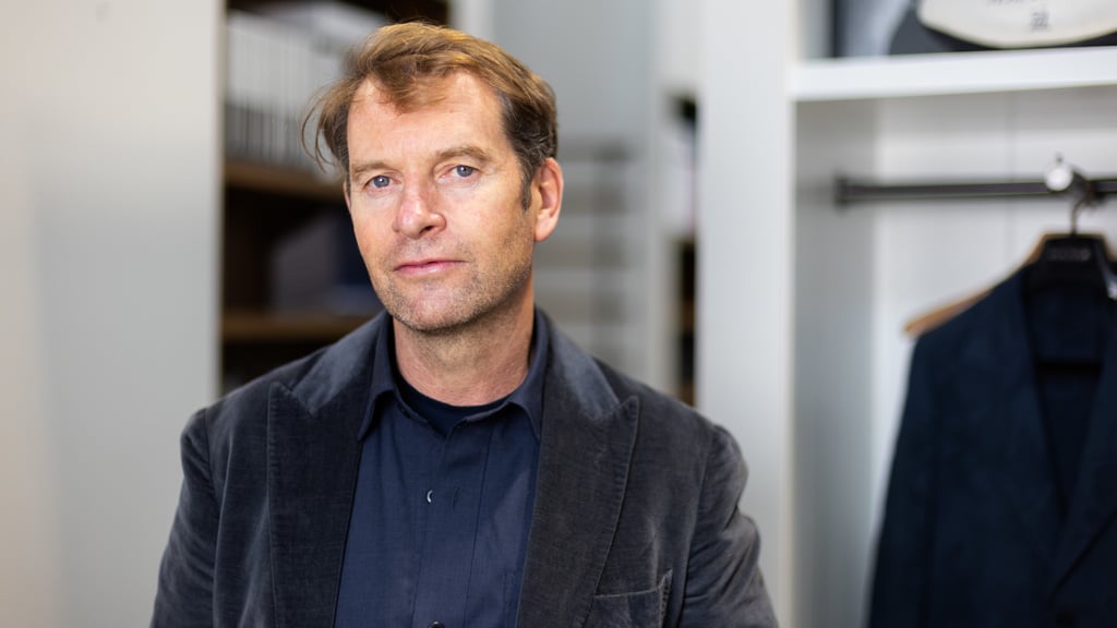 Matt Jensen in his studio looking at the camera