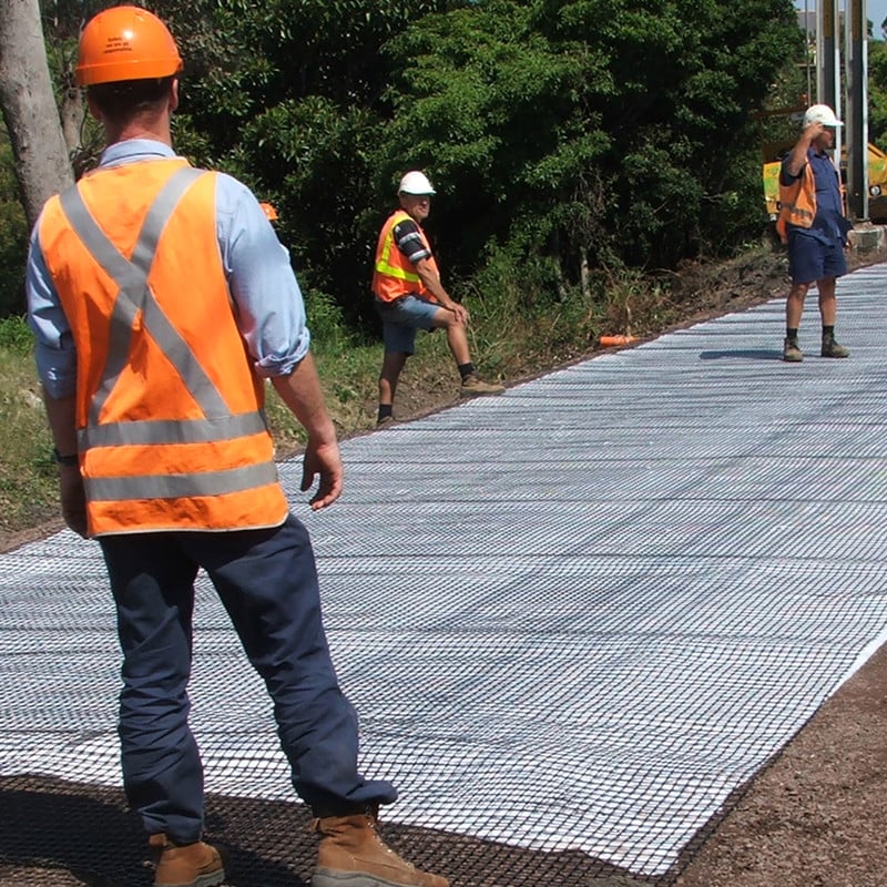 Transport construction workers working on a railway track.