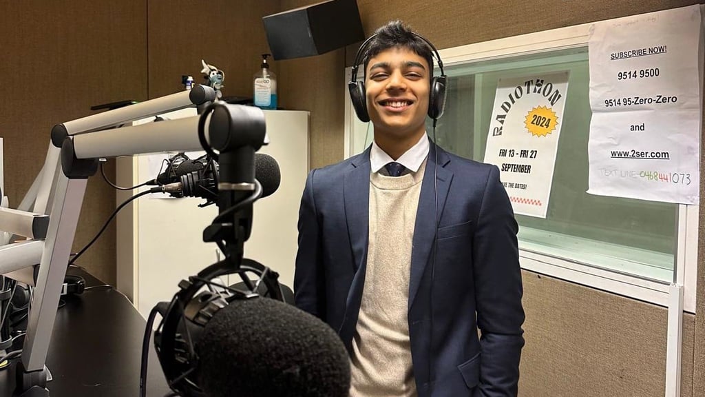 Mahir volunteering at community radio station 2SER.