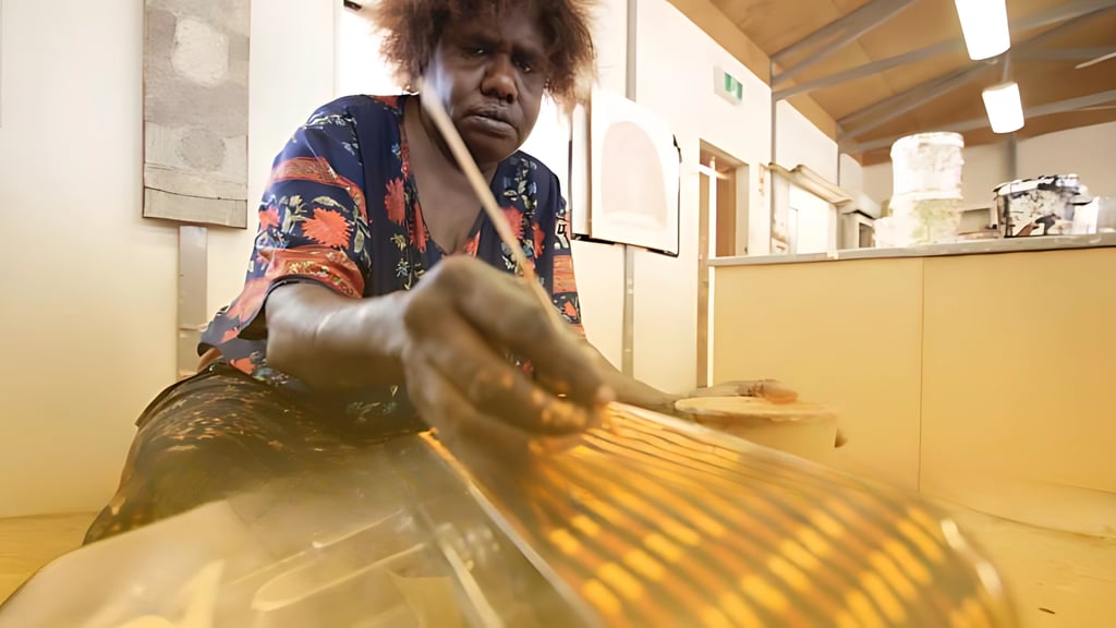 An Indigenous artist painting