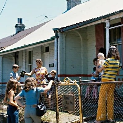Women and children outside Elsie women's refuge in 1975