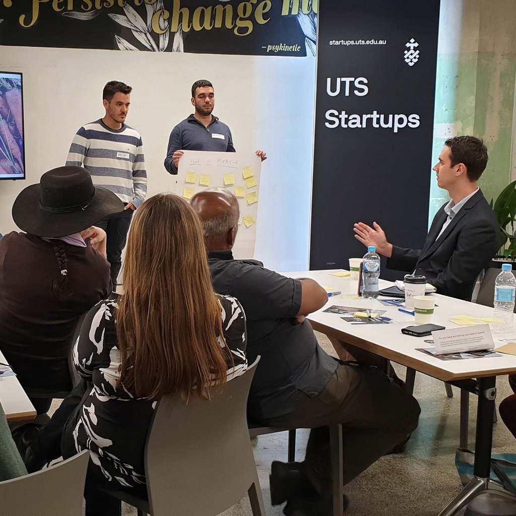 UTS Startups students delivering a presentation in a classroom