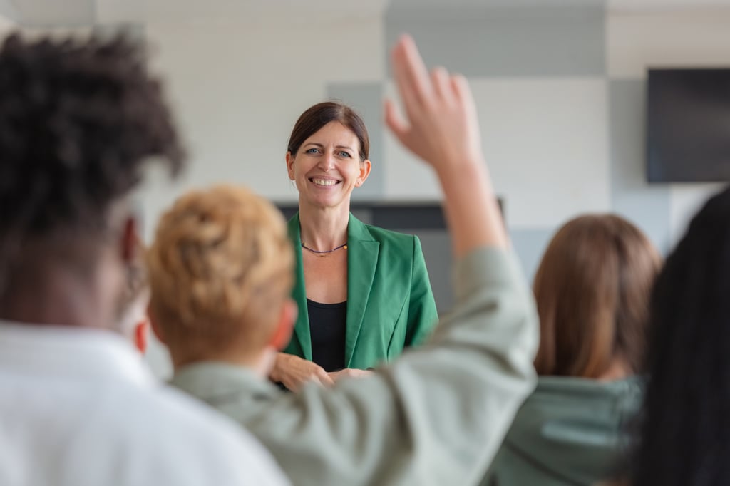 University student asking a question in a classroom