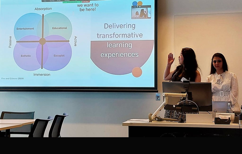 Two people delivering a presentation