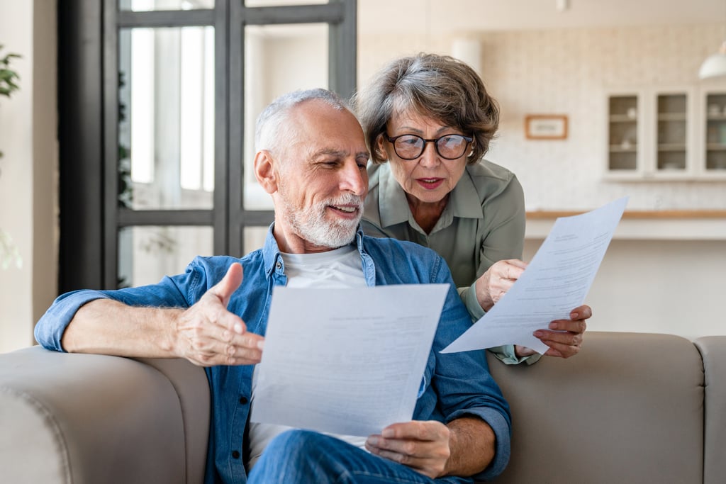 Caucasian senior couple doing paperwork. Picture: Inside Creative House/Adobe Stock