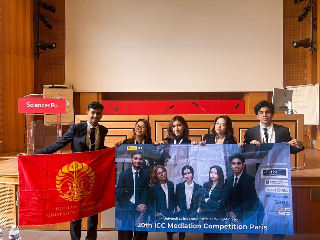Sai poses with the Universitas Indonesia team at the 20th ICC Mediation Competition in Paris