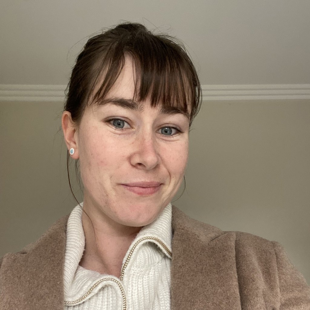 Image of Ruby Blacka, PLT student studying the Graduate Certificate in Professional Legal Practice, she has brown hair in a pony tail and has a fringe.