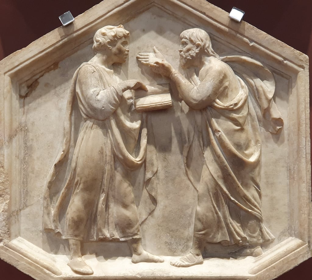 A low relief sculpture depicting Plato and Aristotle arguing by Luca della Robbia, Museo dell'Opera del Duomo (Florence). Picture by Yair Haklai/Wilimedia Commons.