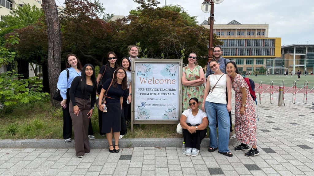 Bella with a group of other pre-service teachers on placement overseas.
