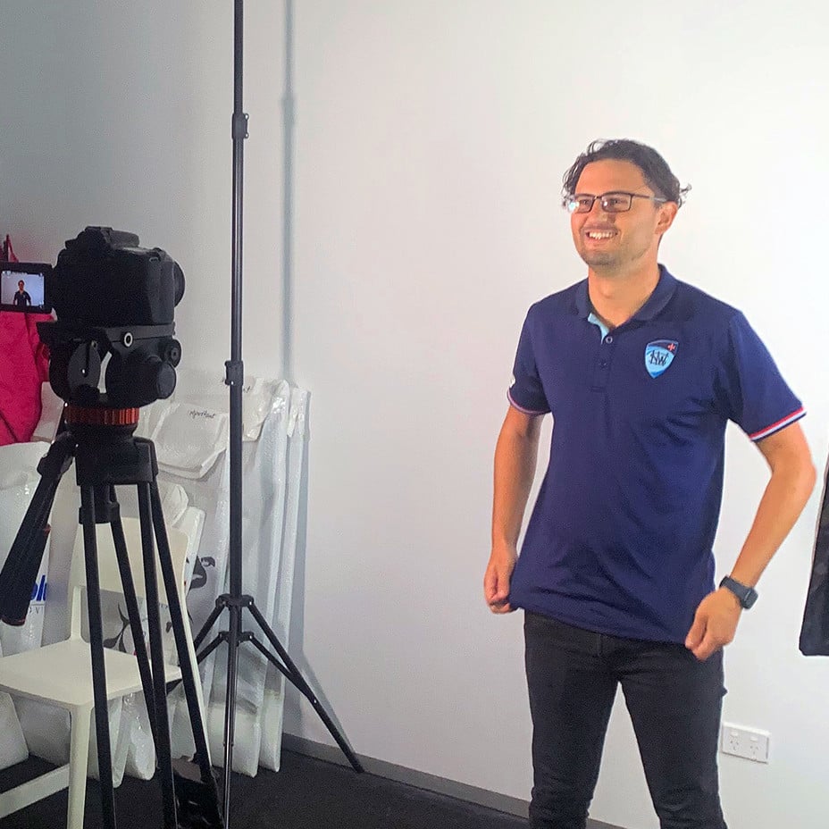 Person having their photo taken in a photography studio