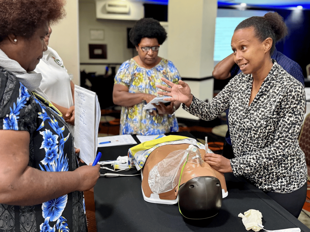 Participants completing training activities.