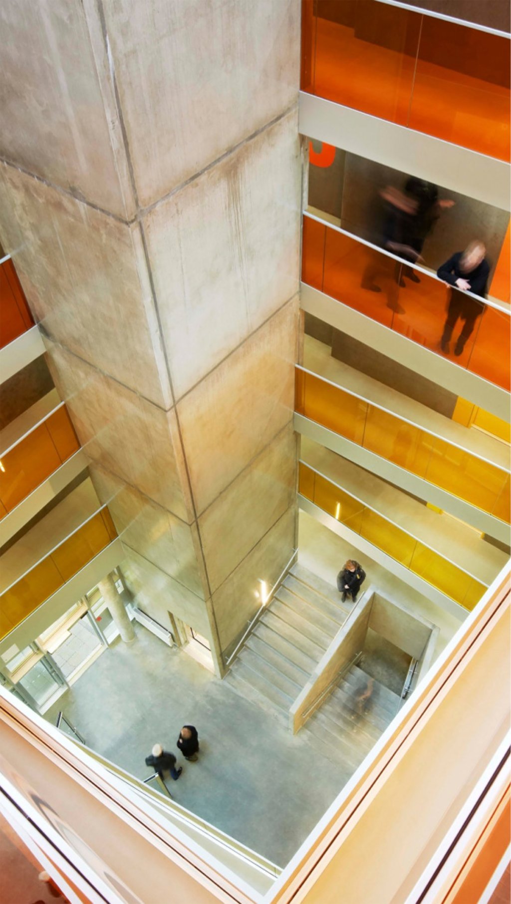 Interior photograph of the Aarhus Student Housing looking down the stairwell.